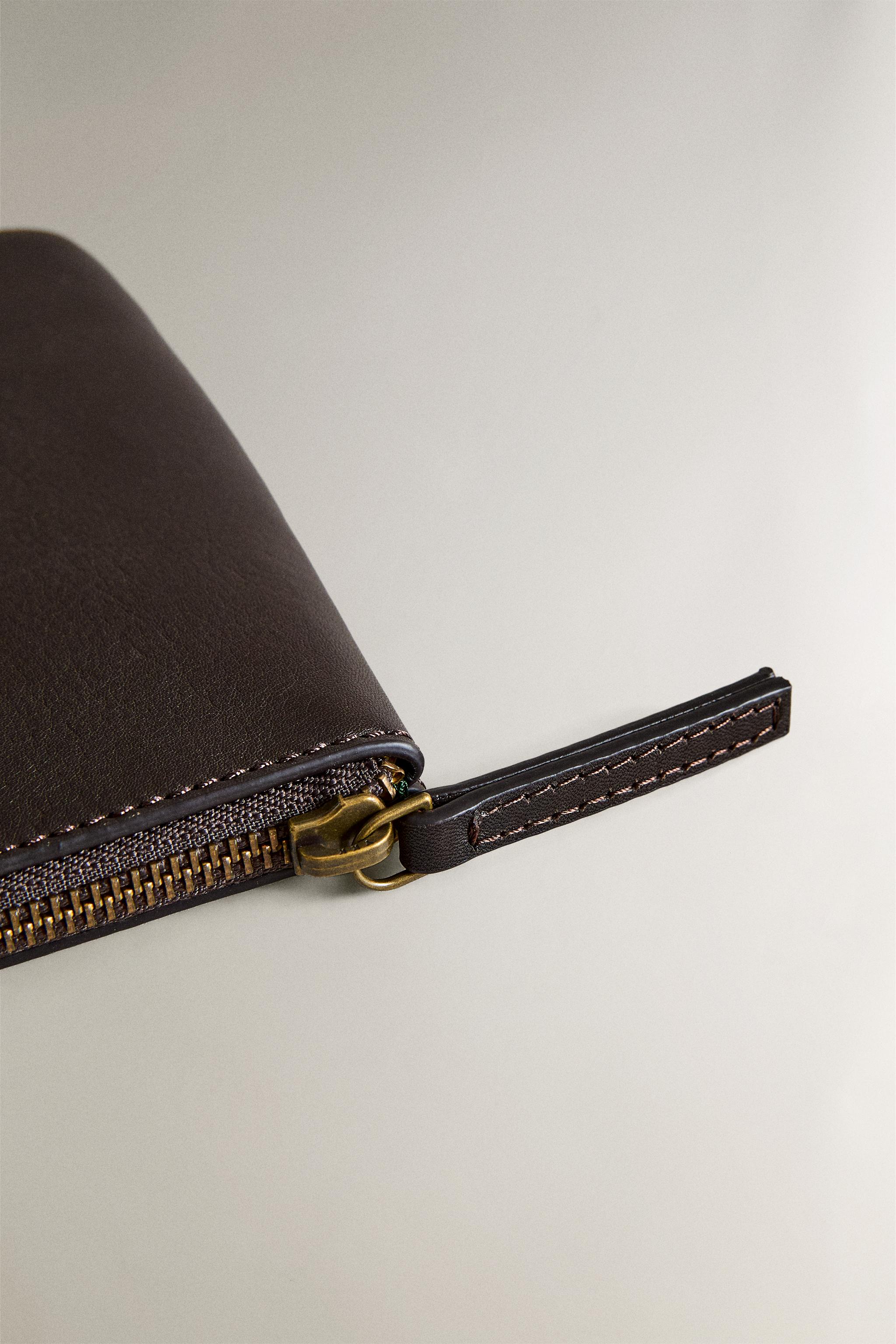 LEATHER "EMERGENCY BAG" MAKEUP BAG